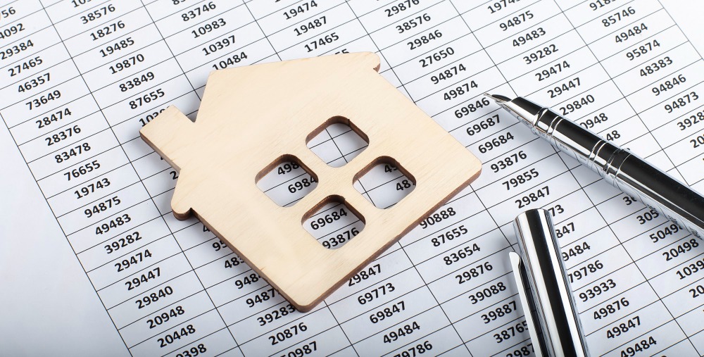 Estate property planning — Services Property paperwork arranged for an estate sale planning discussion